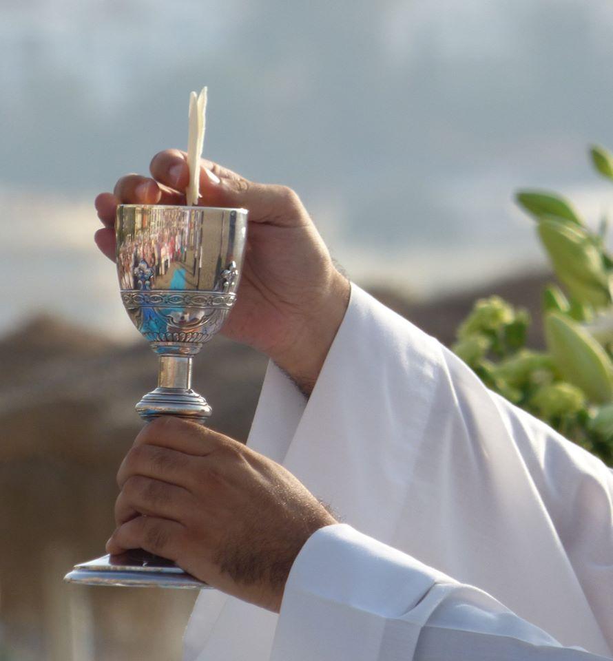 Rosario de la Aurora y misa celebrada en la playa el pasado 5 de julio