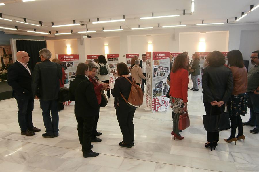 Inauguración de la exposición de Cáritas por su 50 aniversario en la casa hermandad de Estudiantes// CÁRITAS MÁLAGA