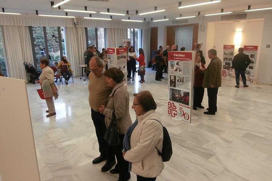 Inauguración de la exposición de Cáritas por su 50 aniversario en la casa hermandad de Estudiantes// CÁRITAS MÁLAGA