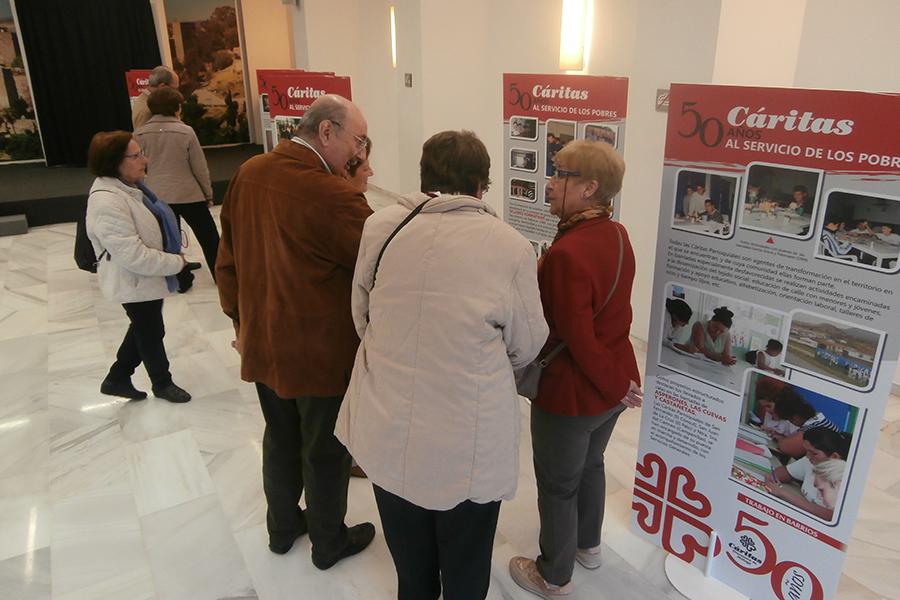 Inauguración de la exposición de Cáritas por su 50 aniversario en la casa hermandad de Estudiantes// CÁRITAS MÁLAGA