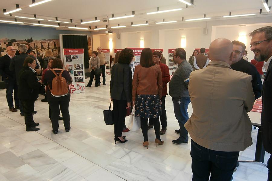 Inauguración de la exposición de Cáritas por su 50 aniversario en la casa hermandad de Estudiantes// CÁRITAS MÁLAGA