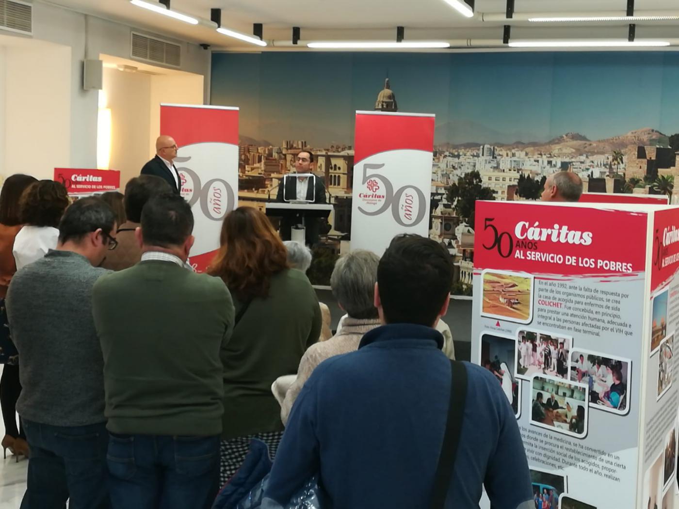 Inauguración de la exposición de Cáritas por su 50 aniversario en la casa hermandad de Estudiantes// CÁRITAS MÁLAGA