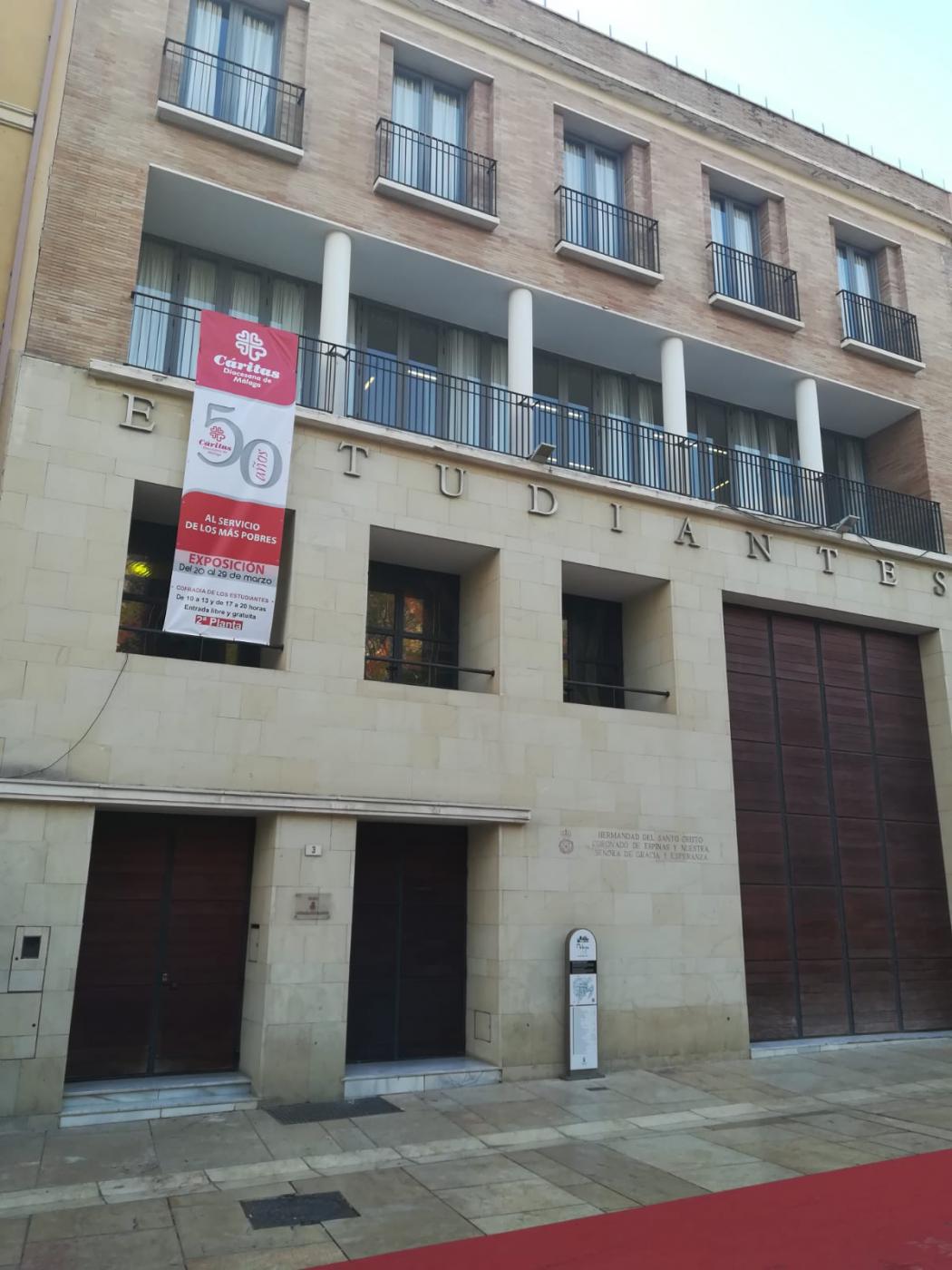 Inauguración de la exposición de Cáritas por su 50 aniversario en la casa hermandad de Estudiantes// CÁRITAS MÁLAGA