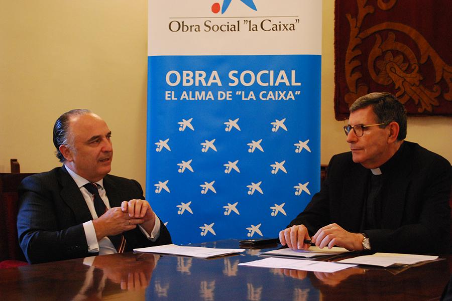 Firma del convenio de colaboración entre la Fundación Victoria y CaixaBank // A.MEDINA